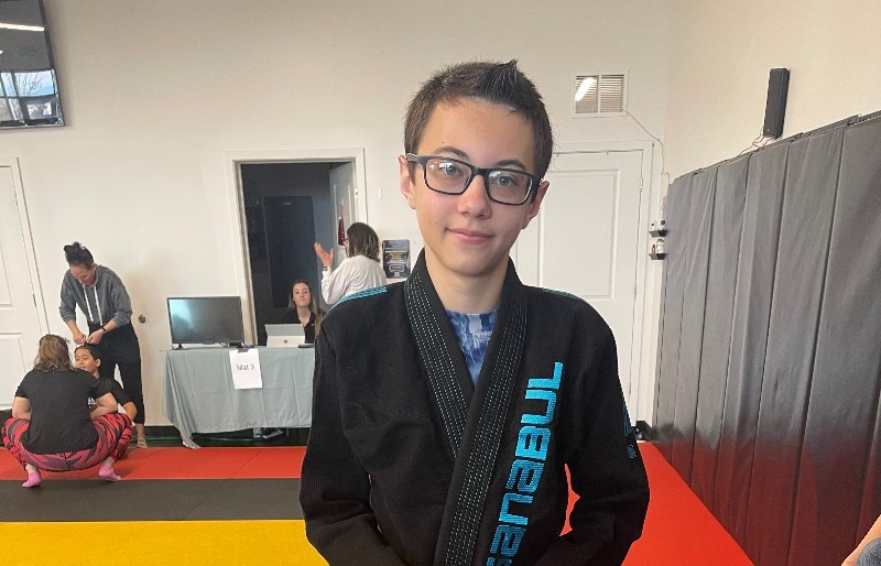 AVC student Carter Haynes poses at a Jiu Jitsu competition.